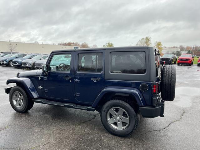 used 2013 Jeep Wrangler Unlimited car, priced at $17,512