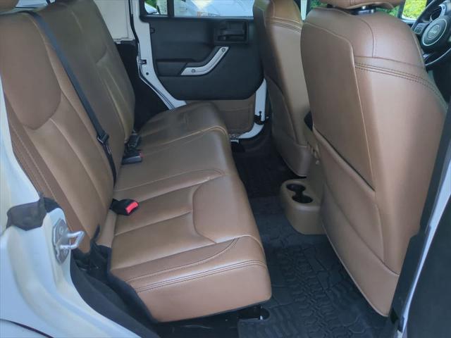 used 2016 Jeep Wrangler Unlimited car, priced at $20,559
