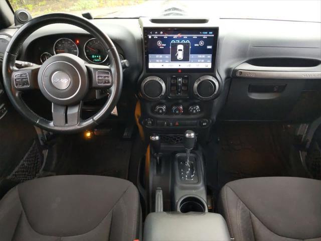 used 2014 Jeep Wrangler Unlimited car, priced at $10,400