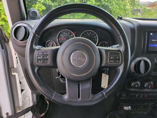 used 2013 Jeep Wrangler Unlimited car, priced at $8,650