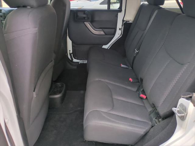 used 2013 Jeep Wrangler Unlimited car, priced at $8,650