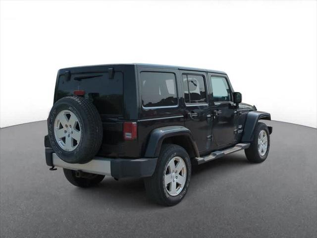 used 2011 Jeep Wrangler Unlimited car, priced at $10,650
