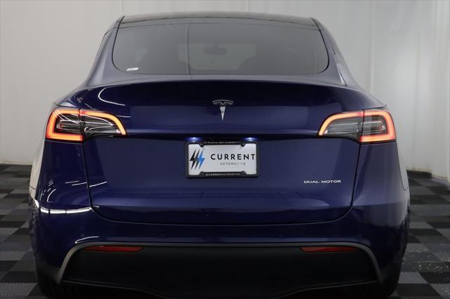 used 2022 Tesla Model Y car, priced at $27,297