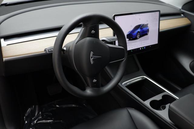 used 2022 Tesla Model Y car, priced at $27,297