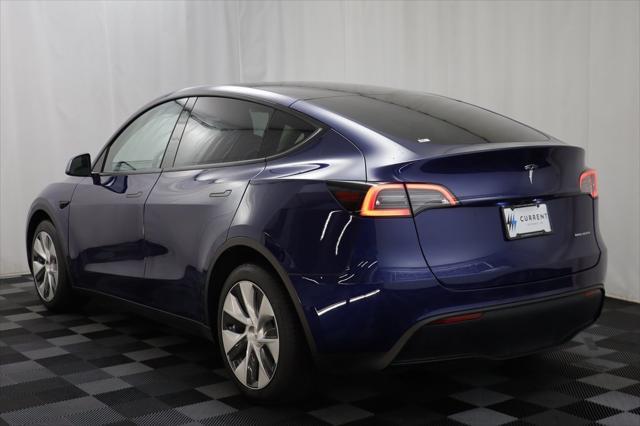 used 2022 Tesla Model Y car, priced at $27,297