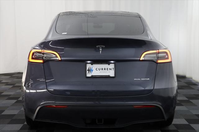 used 2022 Tesla Model Y car, priced at $27,597