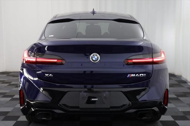 used 2023 BMW X4 car, priced at $56,177