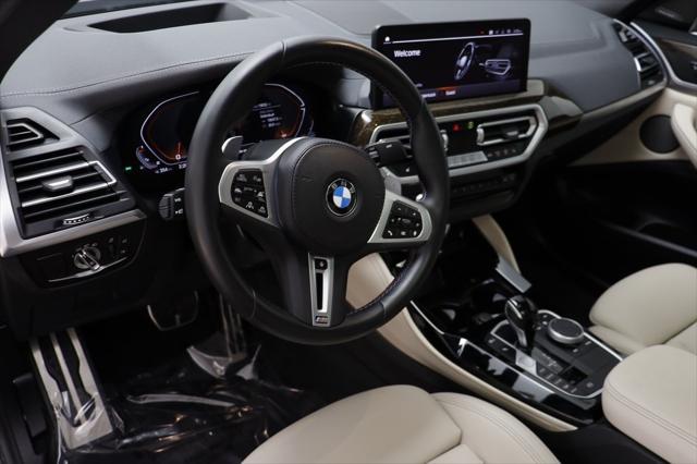 used 2023 BMW X4 car, priced at $56,177