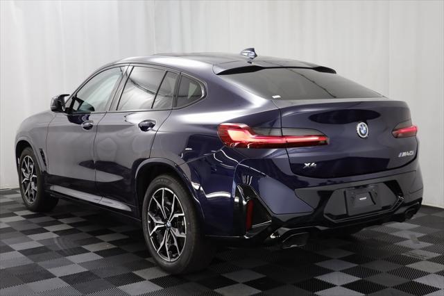 used 2023 BMW X4 car, priced at $56,177