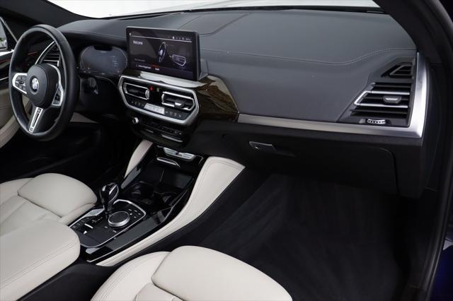 used 2023 BMW X4 car, priced at $56,177