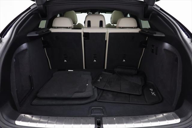 used 2023 BMW X4 car, priced at $56,177
