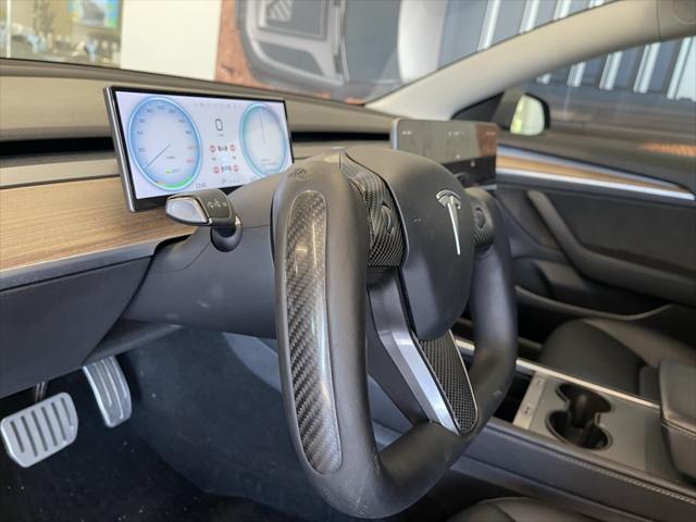 used 2022 Tesla Model 3 car, priced at $27,997