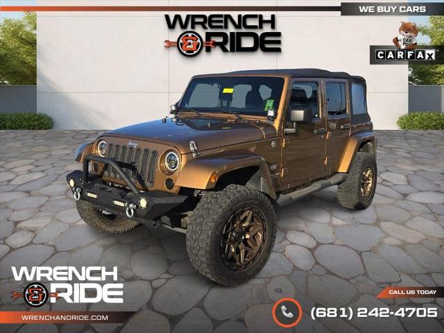 used 2011 Jeep Wrangler Unlimited car, priced at $15,985