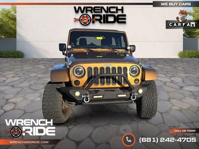 used 2011 Jeep Wrangler Unlimited car, priced at $15,985