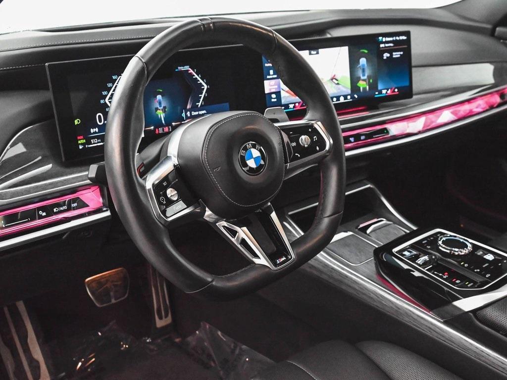 used 2024 BMW 740 car, priced at $67,290