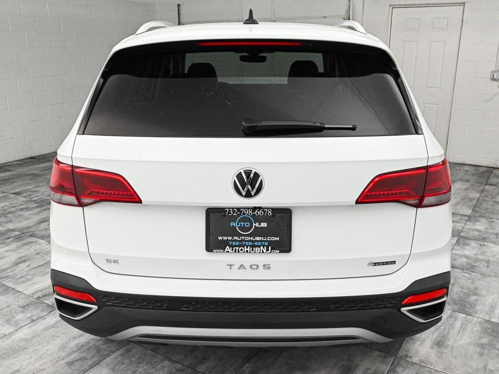 used 2024 Volkswagen Taos car, priced at $23,590