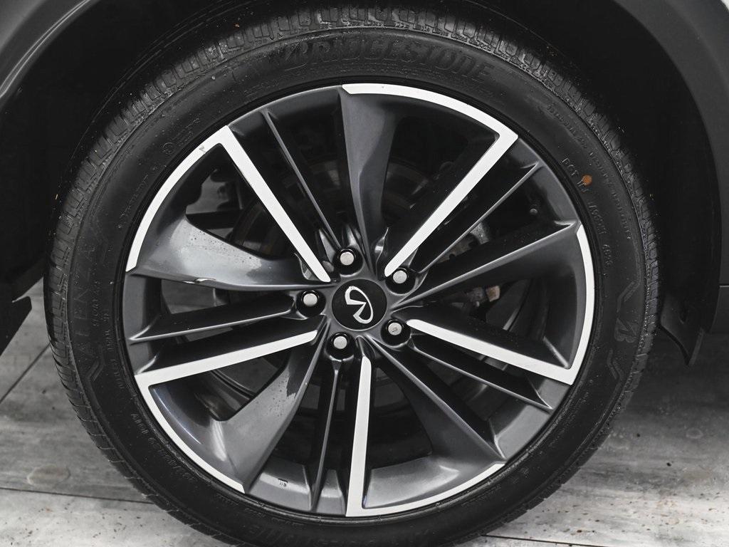 used 2024 INFINITI QX50 car, priced at $33,895