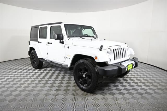 used 2014 Jeep Wrangler Unlimited car, priced at $17,290