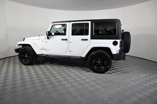 used 2014 Jeep Wrangler Unlimited car, priced at $17,290