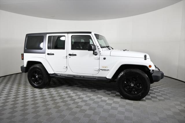 used 2014 Jeep Wrangler Unlimited car, priced at $17,290