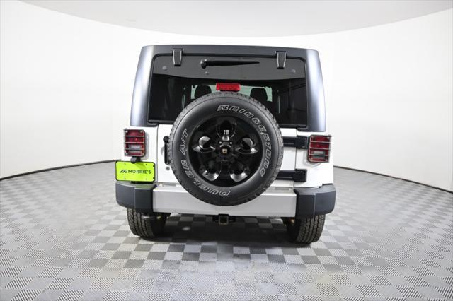 used 2014 Jeep Wrangler Unlimited car, priced at $17,290