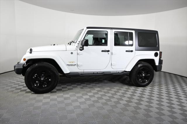 used 2014 Jeep Wrangler Unlimited car, priced at $17,290