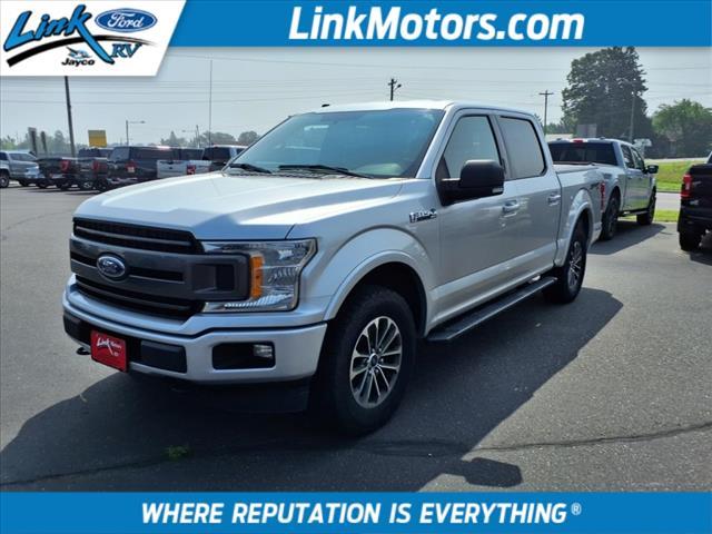used 2018 Ford F-150 car, priced at $23,271