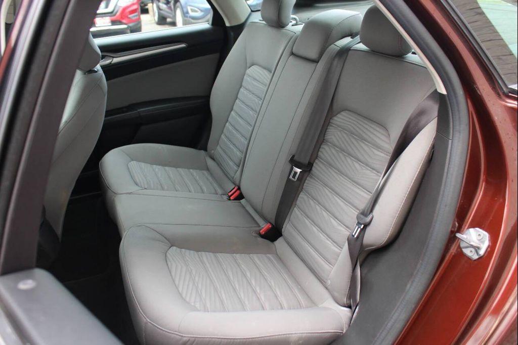 used 2016 Ford Fusion car, priced at $7,999