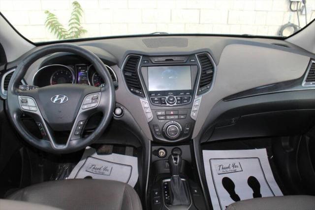 used 2014 Hyundai Santa Fe car, priced at $8,999