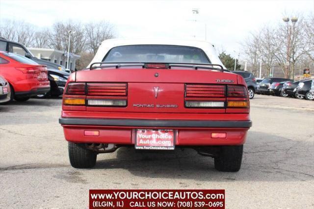 used 1989 Pontiac Sunbird car, priced at $9,799