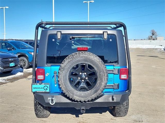 used 2015 Jeep Wrangler car, priced at $21,141