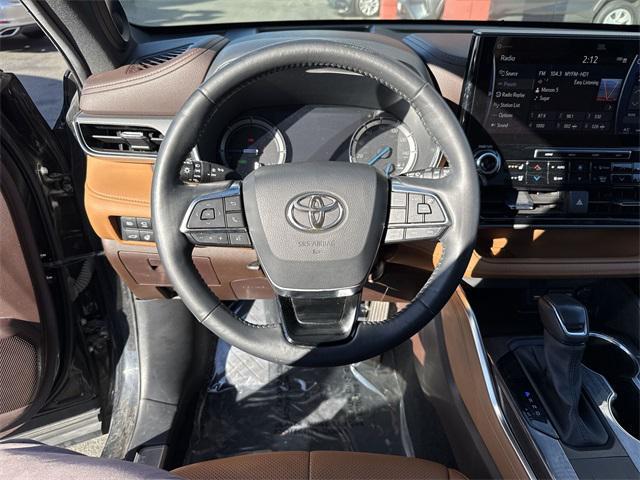 used 2021 Toyota Highlander Hybrid car, priced at $32,868
