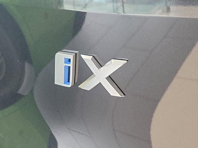 new 2024 BMW iX car, priced at $97,195