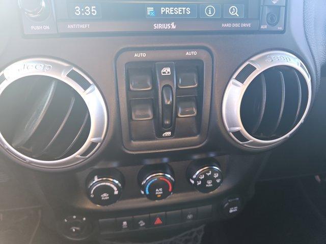 used 2013 Jeep Wrangler Unlimited car, priced at $17,990