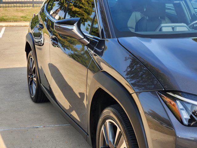 used 2025 Lexus UX 300h car, priced at $36,975