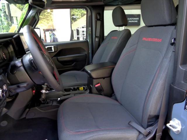 used 2024 Jeep Wrangler car, priced at $44,895