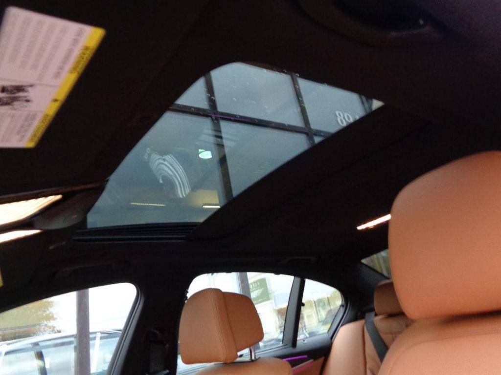 used 2023 BMW M550 car, priced at $62,995