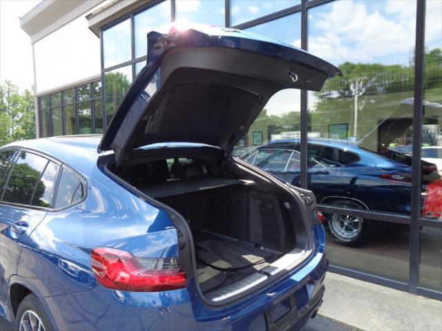 used 2021 BMW X4 car, priced at $44,895