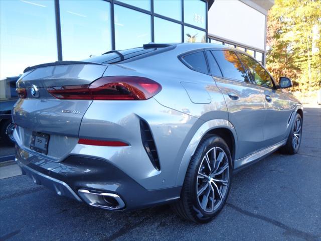 used 2024 BMW X6 car, priced at $61,495