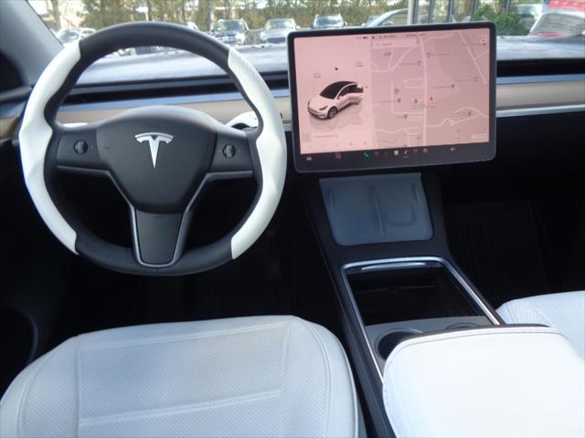 used 2024 Tesla Model Y car, priced at $39,495