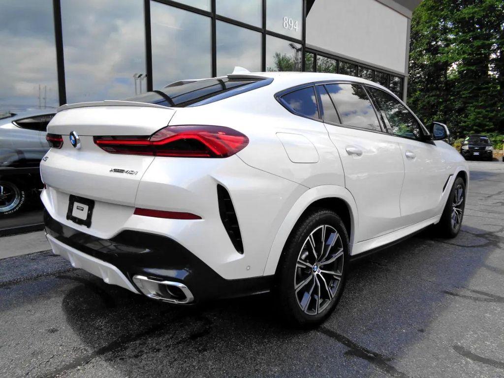 used 2023 BMW X6 car, priced at $52,495