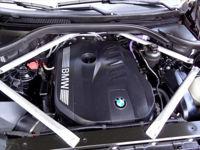 used 2024 BMW X6 car, priced at $63,995