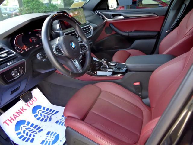 used 2023 BMW X4 car, priced at $49,995