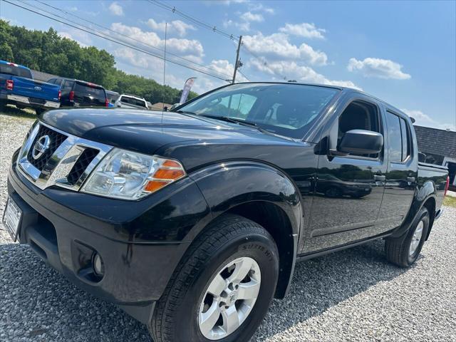used 2013 Nissan Frontier car, priced at $9,000