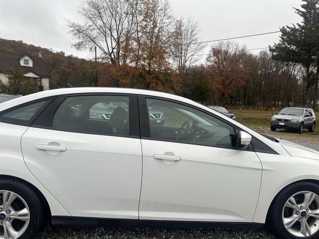 used 2014 Ford Focus car, priced at $4,999