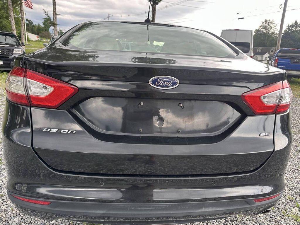 used 2013 Ford Fusion car, priced at $7,999