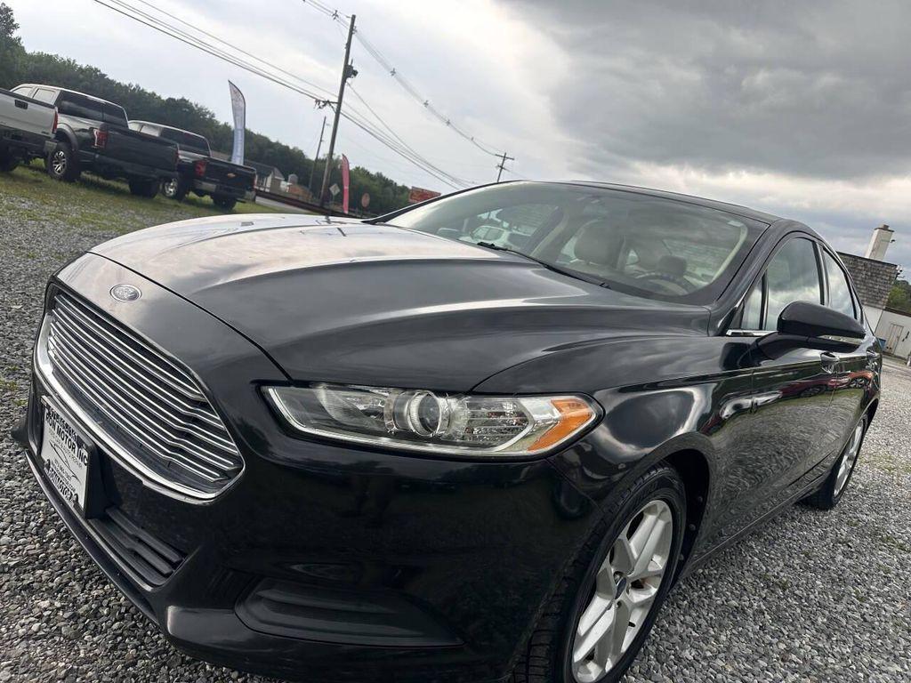 used 2013 Ford Fusion car, priced at $7,999