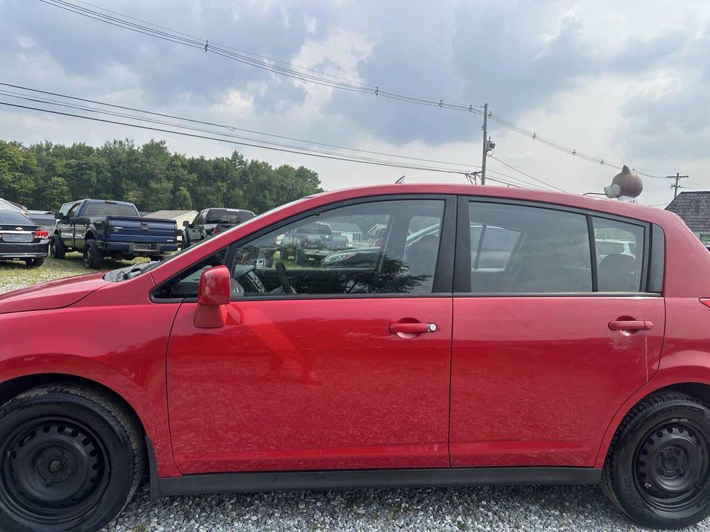 used 2009 Nissan Versa car, priced at $4,999