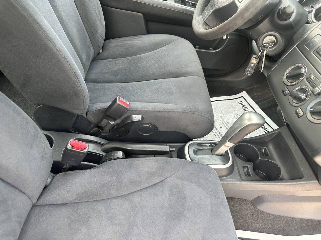used 2009 Nissan Versa car, priced at $4,999