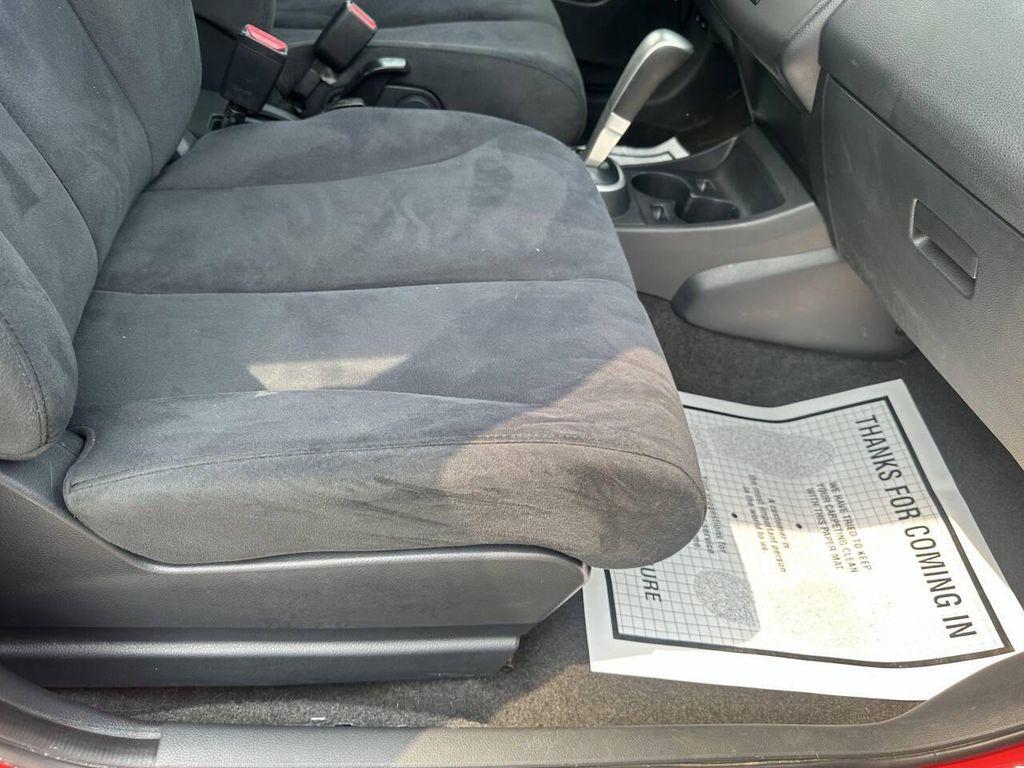 used 2009 Nissan Versa car, priced at $4,999